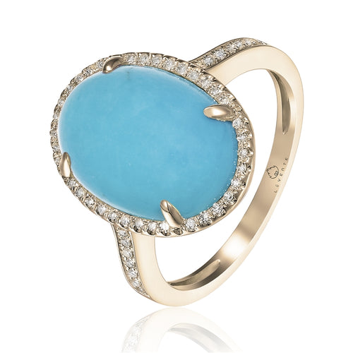 A Favorite Combo. Turquoise and Yellow Gold.  This 14 Karat Ring Features a 5.92 Carat Oval Turquoise with just the right amount of Diamonds  to accent this Beauty